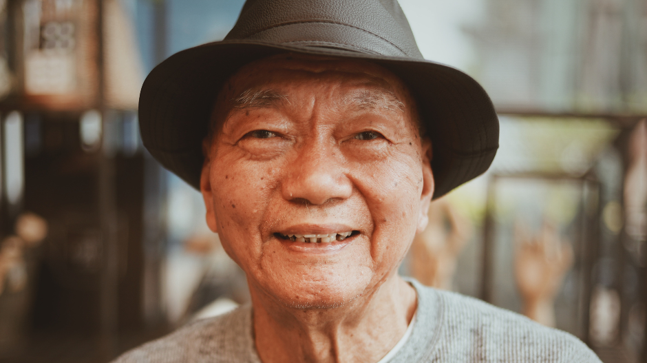 Senior man enjoying coffee in a memory cafe